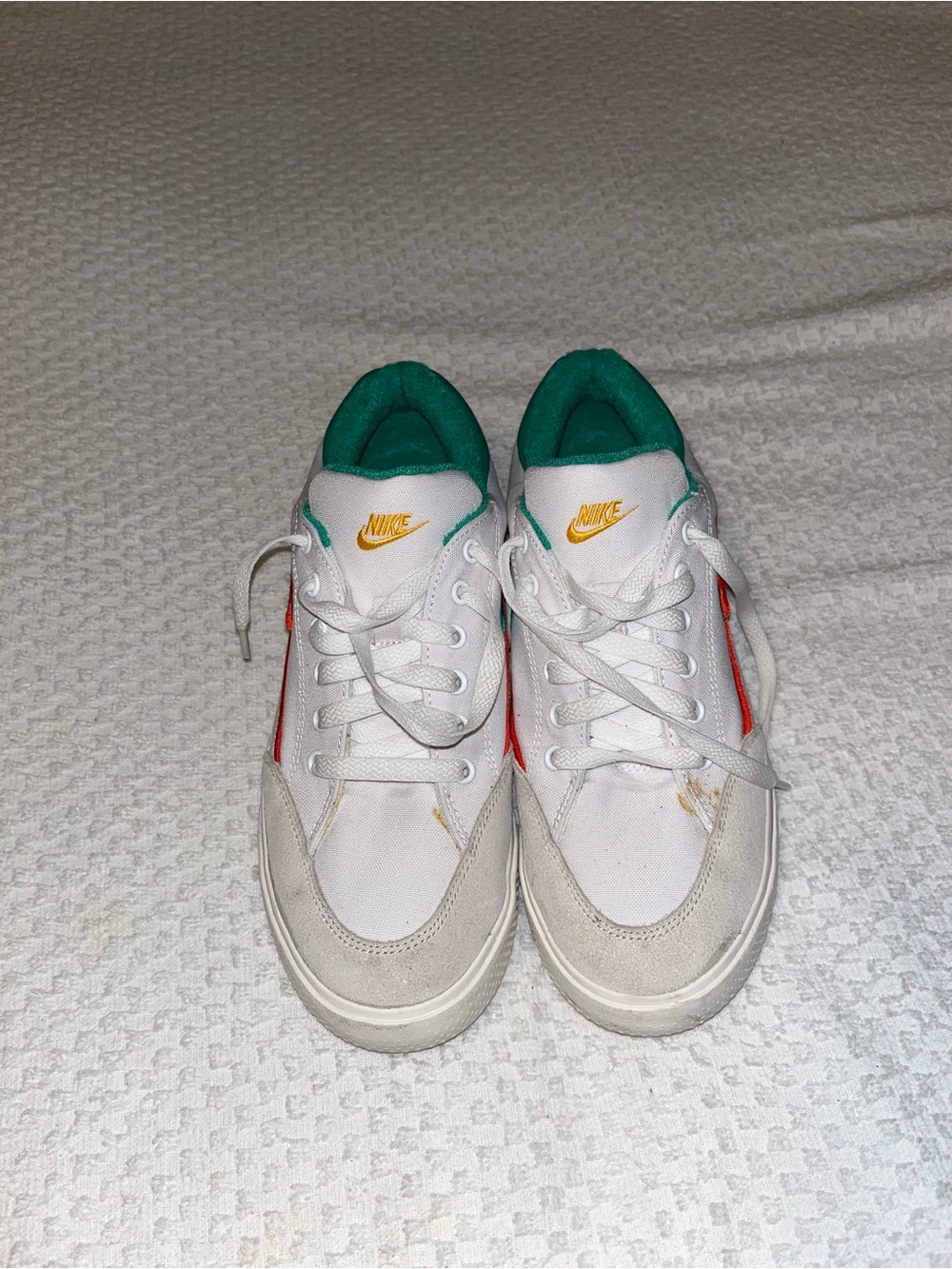 Nike Kids White Sneakers with Green Lining and Orange Swoosh